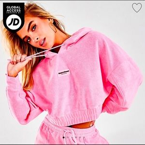 supply and demand pink long sleeve crop top, size small